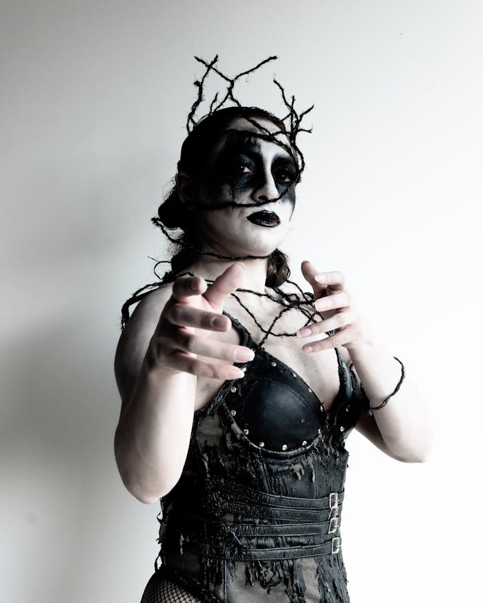 Gothic Cosplay Attire with Dark Makeup